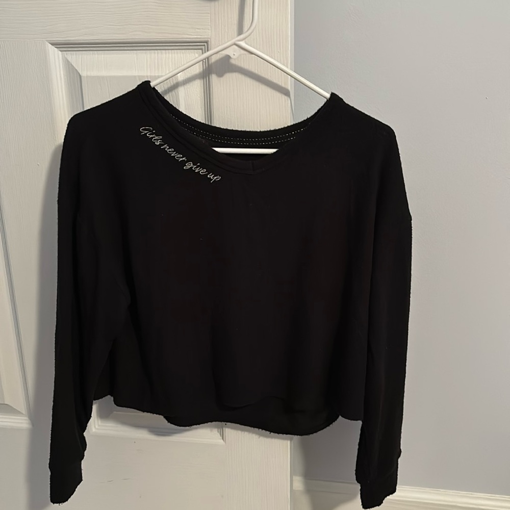 Black cropped Justice sweatshirt.